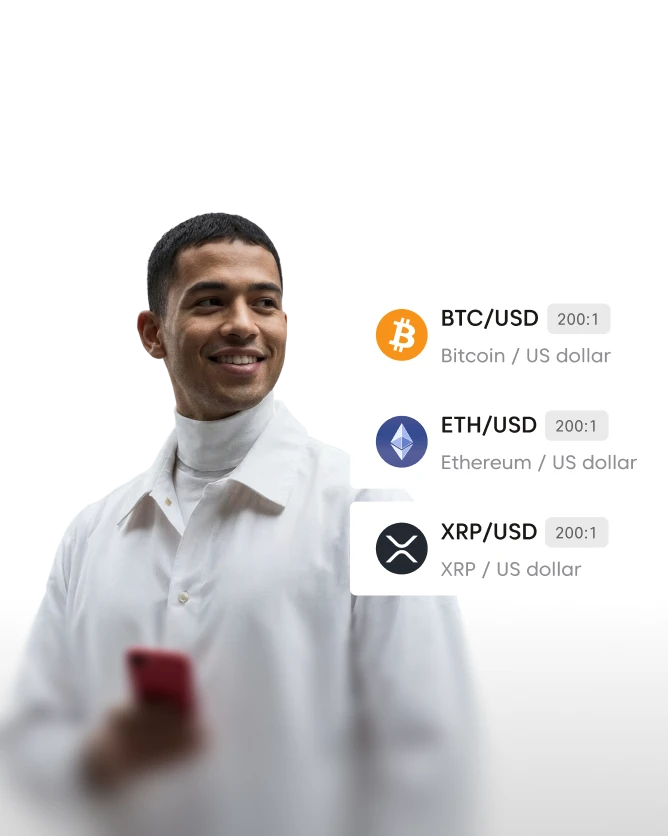 Man in white smiling beside a BTC/USD, ETH/USD and XRP/USD crypto CFD watchlist