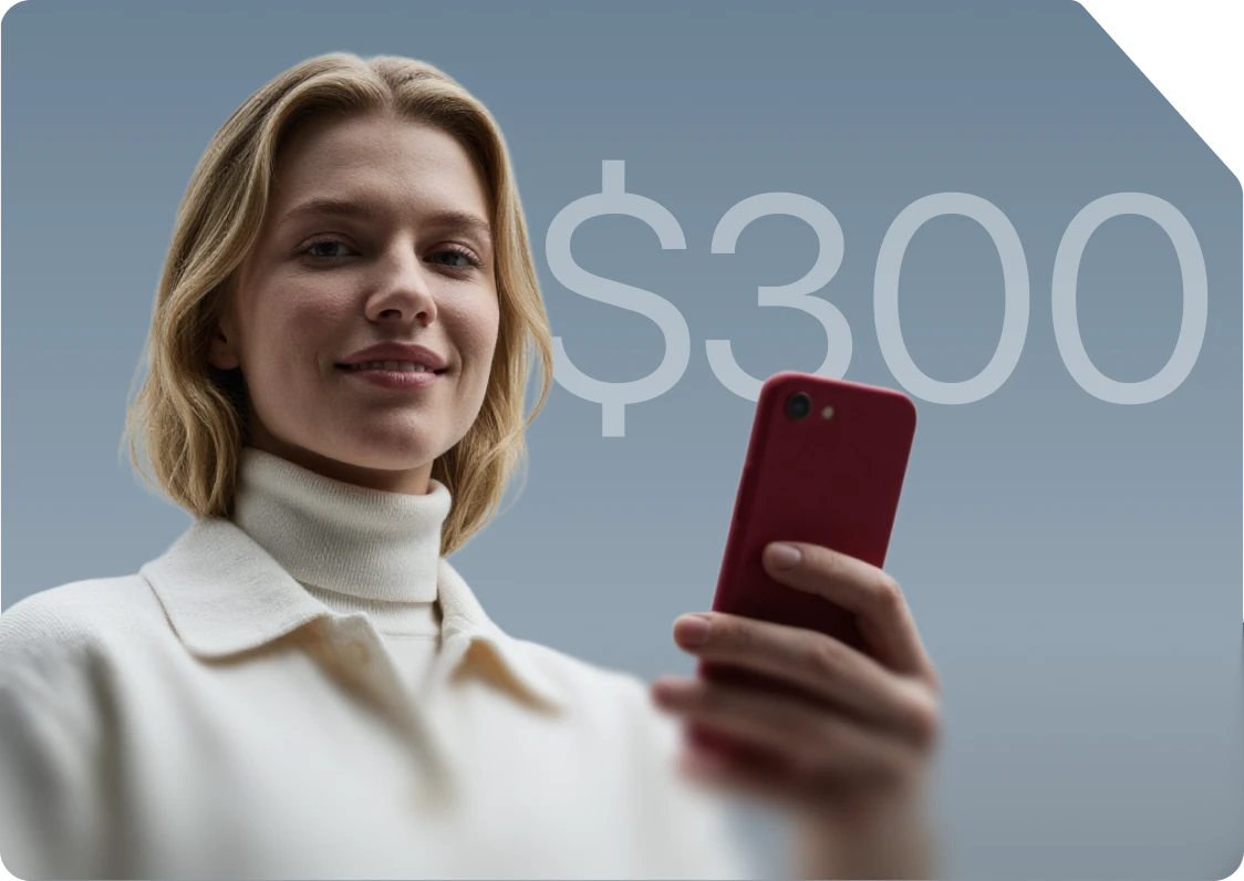 Woman checking her phone beside a $300 commission graphic