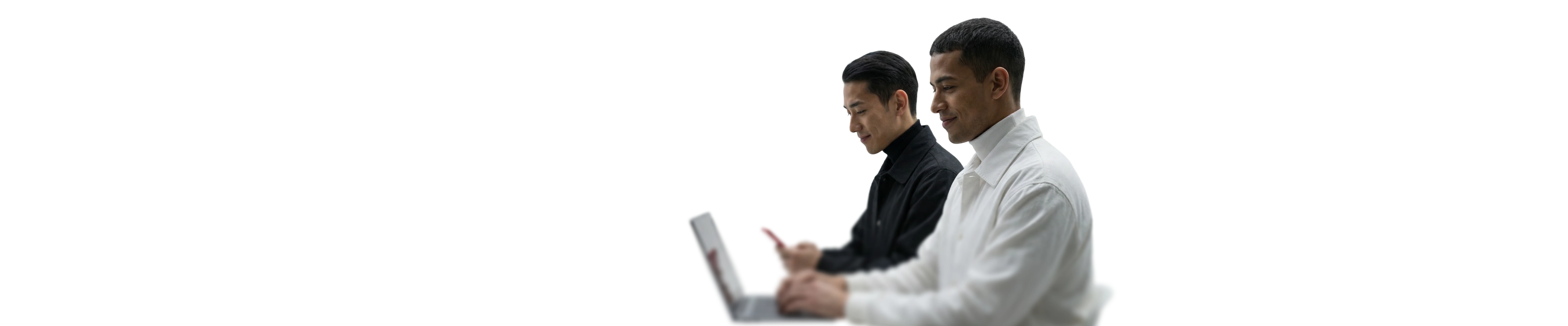 two-people-checking-notebook-and-phone